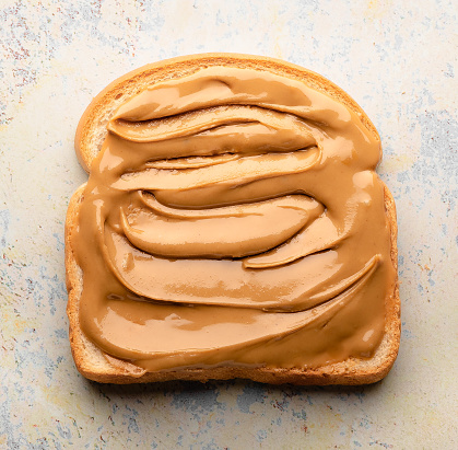 peanut butter toast for breakfast, shiny, and delicious