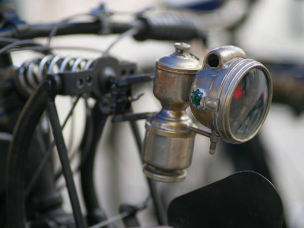 details of vintage motorcycles taken at a meeting on a public road
