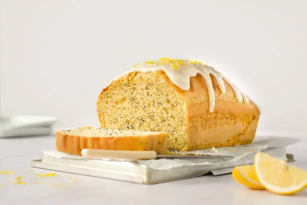 Photo of lemon poppy seeds cake with lemon icing