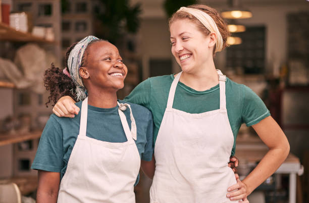 istock Creative workshop, teamwork and women in small business, artistic startup and pottery studio. Collaboration, success and happy female friends with ceramic production, clay sculpture and artwork store 1474838297