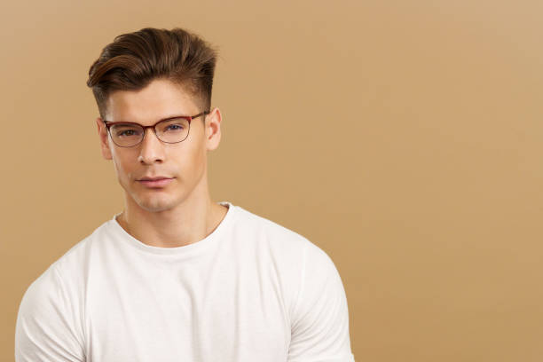 istock Handsome man with eyeglasses looking at camera 1474838584