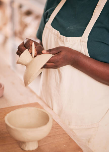 istock Art, pottery and black woman hands in creative workshop with ceramics, sculpting and creativity with clay pot zoom. Artist, handmade craft and manufacturing, artistic process with texture and skill 1474840556