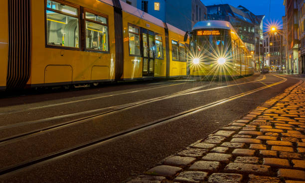 istock Train On Railroad Track In City At Night 1474841316