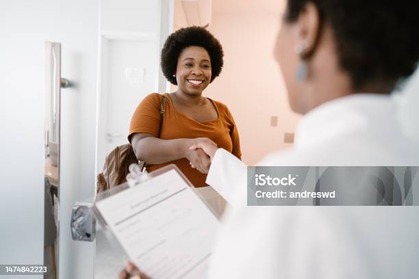 Arriving At The Doctors Office Shake Hands Stock Photo - Download Image Now - Doctor, Patient, Healthcare And Medicine