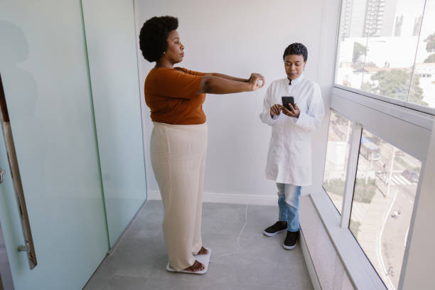 istock Body weight using bioimpedance scale bioimpedancia 1474842412