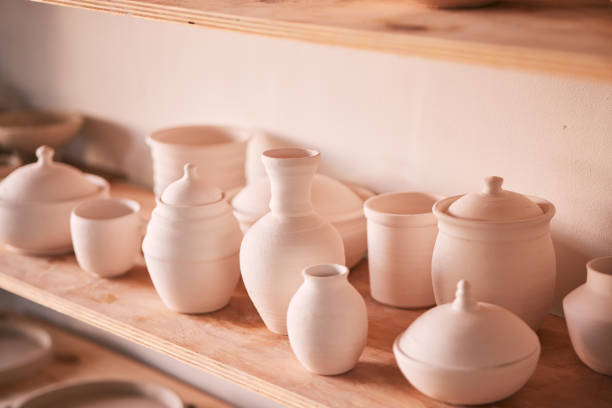 istock Pottery background, creativity and shelf in studio, creative store or manufacturing startup. Clay design, collection and display in workshop, small business and retail craft shop of stock production 1474844216