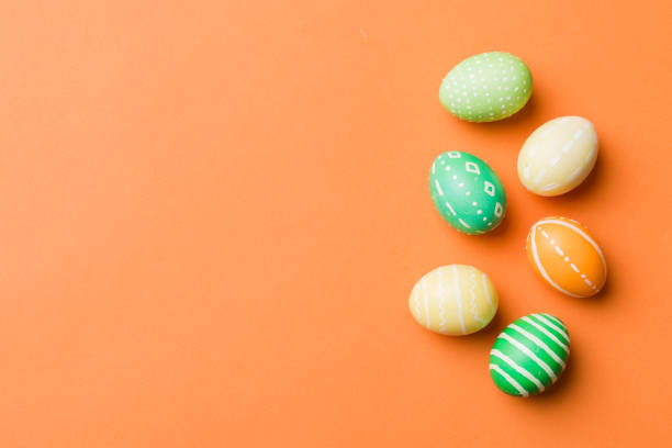 istock holiday preparation Multi colors Easter eggs on colored background . Pastel color Easter eggs. holiday concept with copy space 1474845983