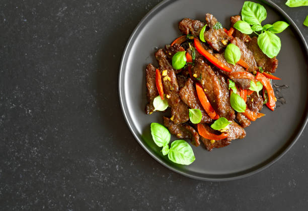 istock Thai beef stir-fry with pepper and basil 1474846045