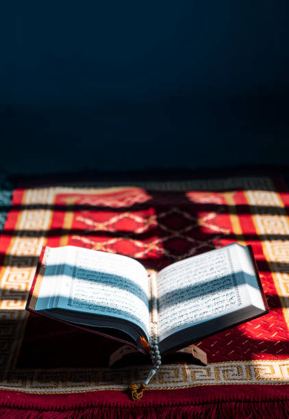 istock Rehal with open Quran and Muslim prayer beads 1474850710