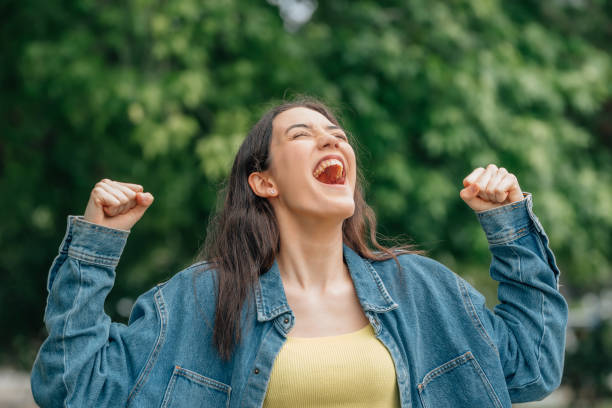 istock girl screaming free excited with joy 1474850749