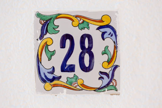istock Old Weathered House Number 28, Tile on Wall 1474851169