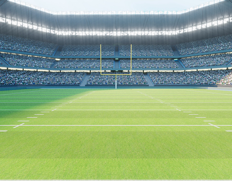 An American football stadium with posts on a marked green grass pitch in the daytime - 3D render