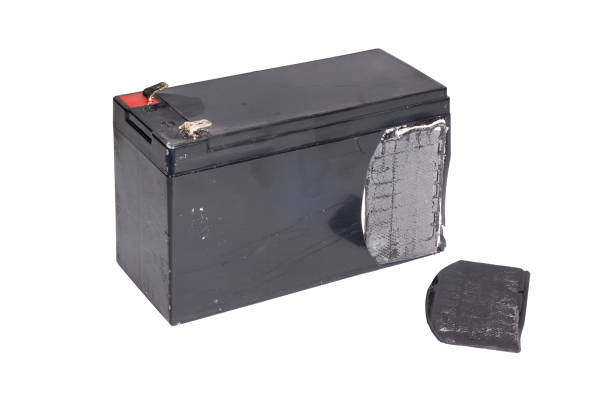 istock Broken sealed battery and shown the elemental plate inside isolated on white background 1474856324
