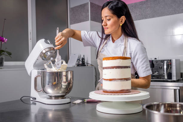 istock Colombian pastry chef mixes ingredients 1474858452