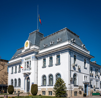 Pitești, Argeș County, Romania - March 18, 2023:  Front of the historic Pitești Town Hall building.