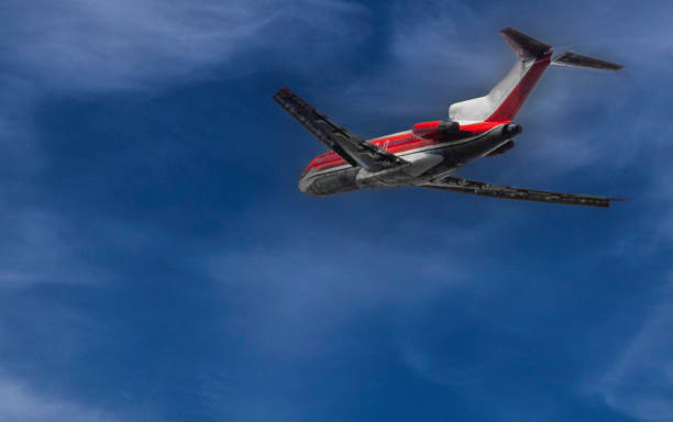 istock Airplane in the blue sky with clouds. Travel concept. Airplane 1474862982