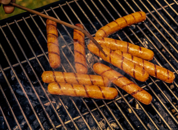 istock Grilled sausages on the barbecue grill 1474863029