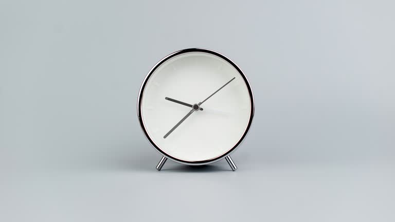 Clock with the hands of the clock turning function of elapsed time The concept of time. Time lapse time.