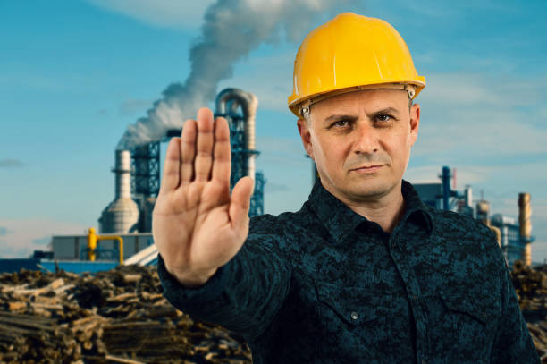 istock Engineer stopping you from entering lumbering factory 1474873363