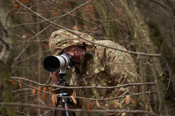 istock Wildlife photographer with camera 1474873807