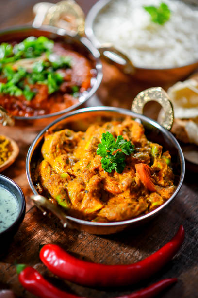 istock Hot madras paneer and vegetable masala with rice 1474873856