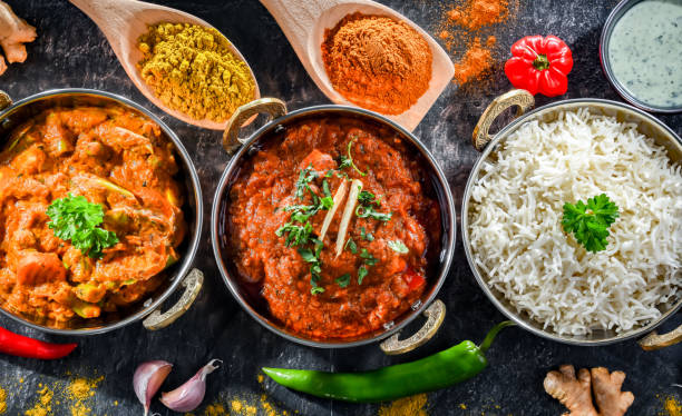 istock Hot madras paneer and vegetable masala with rice 1474873873