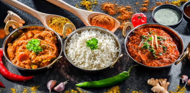istock Hot madras paneer and vegetable masala with rice 1474873931