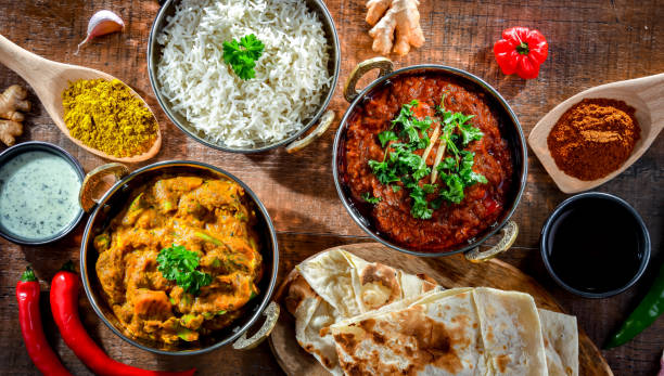 istock Hot madras paneer and vegetable masala with rice 1474873944