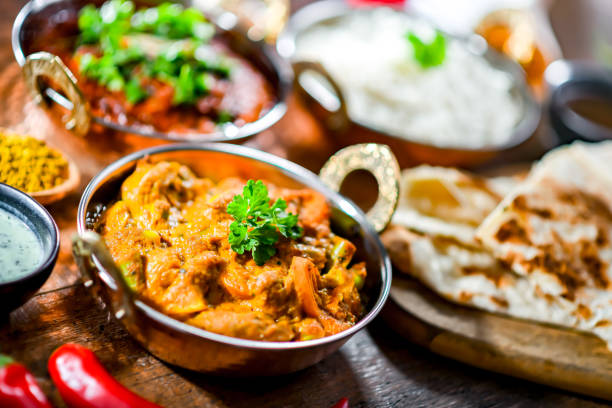 istock Hot madras paneer and vegetable masala with rice 1474873953