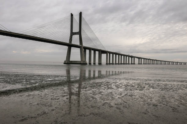 istock The Vasco Da Gama bridge on a cloudy day 1474877301