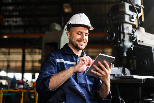 istock Mechanical engineer technician checking and inspecting machine at repair shop 1474877878