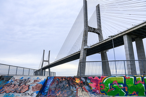 Lisbon, Portugal- October 21, 2022: The Vasco Da Gama bridge on a cloudy day in Lisbon