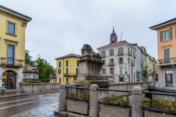 Monza, Italy - February 26, 2023: View of the Ponte dei Leoni (Lion bridge), with locals and visitors, in Monza, Lombardy, Northern Italy