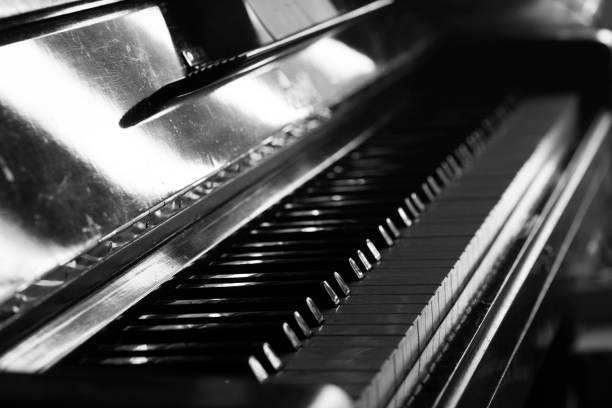 istock old vintage piano, close up , black and white 1474881142