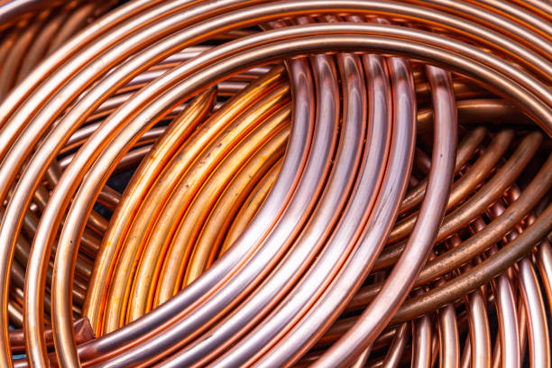 istock New copper twisted pipes of the same diameter. 1474881682