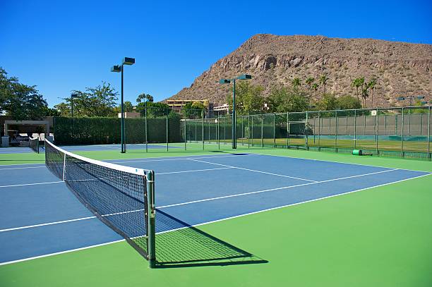 istock Blue Tennis Courts at a Resort 147488211