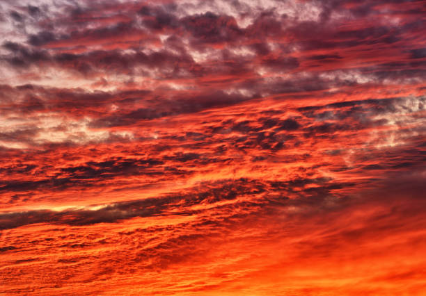 istock Beautiful morning sky with colorful clouds before sunrise. Dramatic sunrise 1474884082