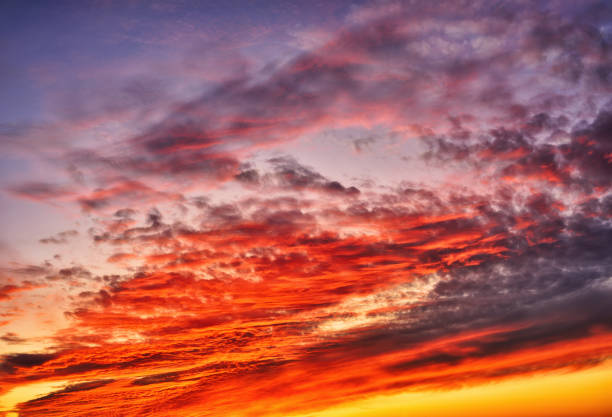 istock Beautiful morning sky with colorful clouds before sunrise. Dramatic sunrise 1474884088