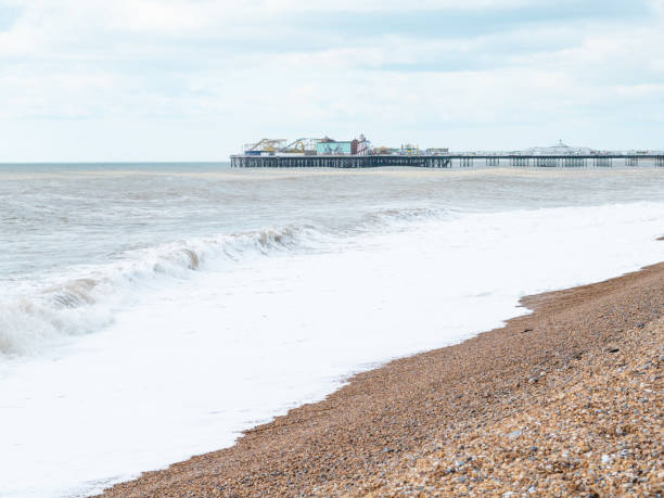 istock blue sea with waves and sandy shore ,beautiful natural seascape 1474887930