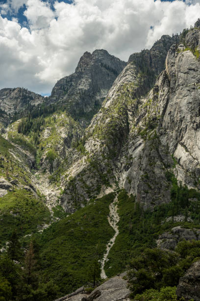 istock Jagged Granite Peaks with Storm Clouds Gathering 1474888356