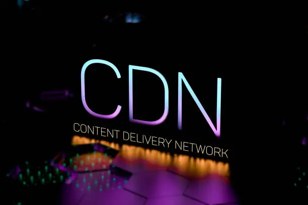 Photo of CDN Content Delivery Network text concept neon.CDN network infrastructure. 3D render.