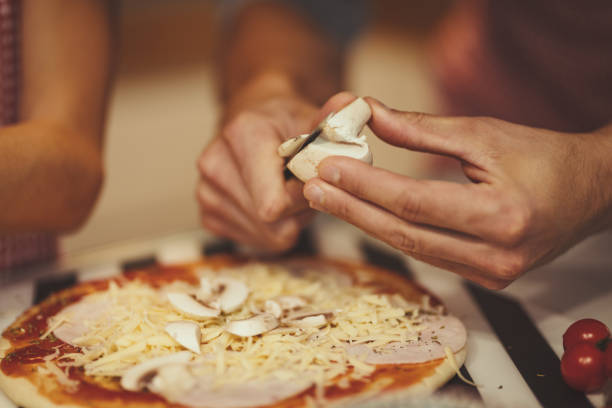istock Mushrooms On The Pizza 1474890647