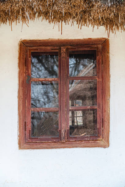 istock Traditional old house with thatched roof. 1474891064