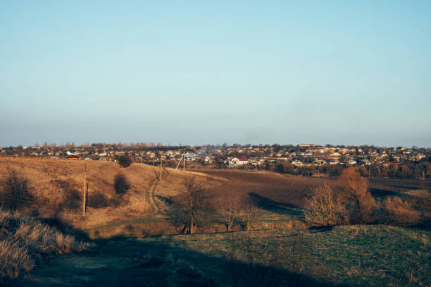 istock Ukrainian landscape village and field in spring 1474893675