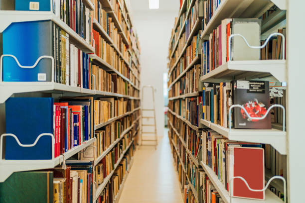 istock Bookshelves in the public library 1474897573