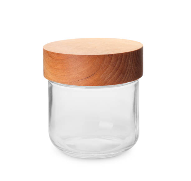 istock New empty glass jar with wooden lid isolated on white 1474902425
