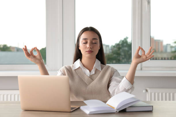 istock Find zen. Woman taking break from work at table in room 1474902945