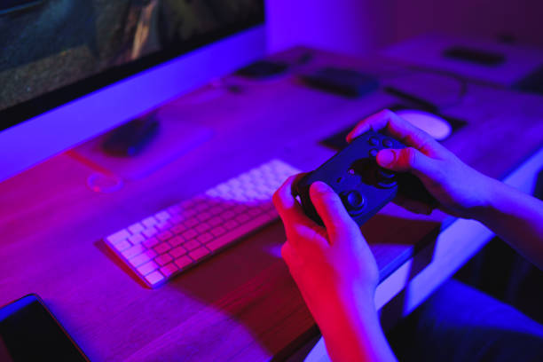 istock Teenage Boy Playing Multiplayer Games and using the joystick - close up 1474904944