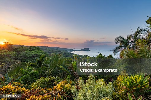 istock Vibrant Sunrise over the Wild Untamed Coastal Beauty of Manuel Antonio National Park on the Pacific Coast of Costa Rica 1474914272