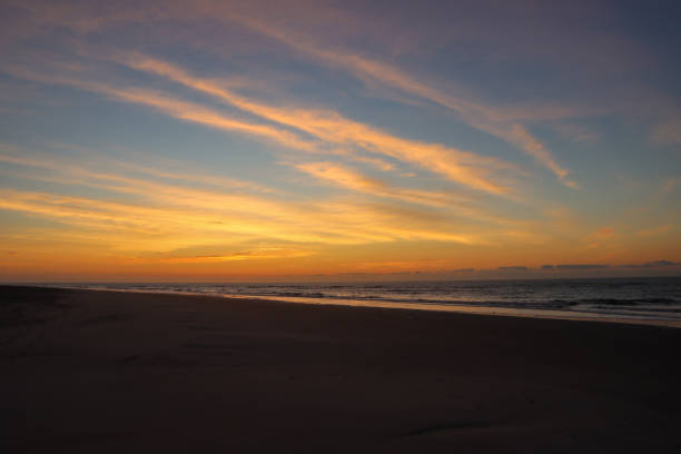 istock Sunrise at the beach 1474917456